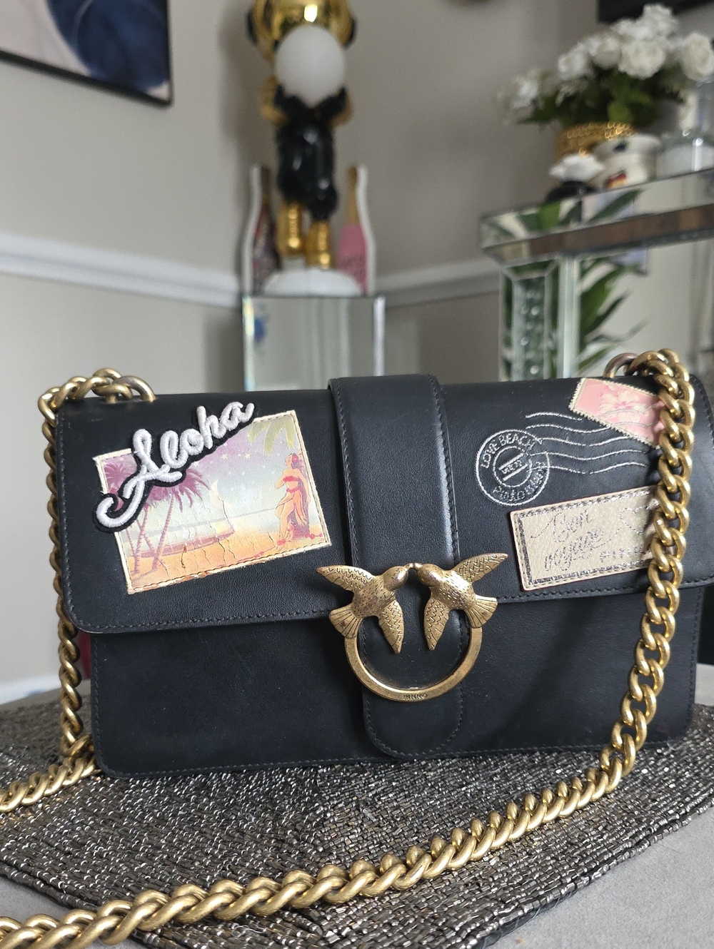 Pinko Black Crossbody Bag with Gold Chain and Decorative Patches